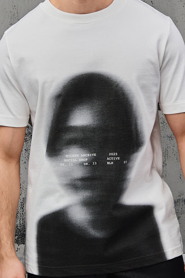 Wicked33 Archive oversized t-shirt in white, large graphic spray-effect print on chest