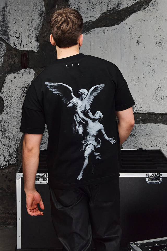 Wicked33 Ascend oversized t-shirt, large grayscale back print of baroque-style angel & man sculpture