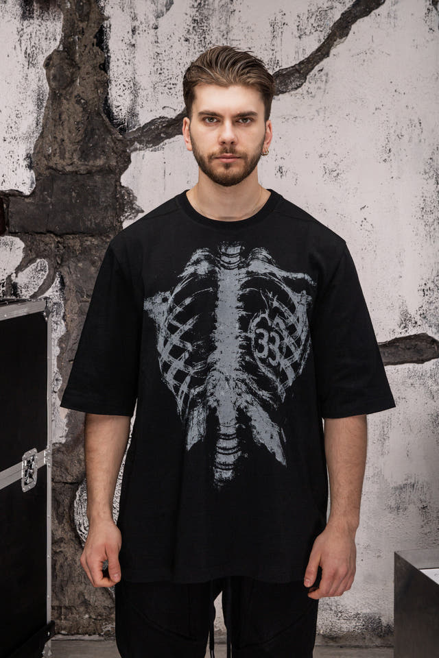 Wicked33 Skeleton oversized t-shirt in black, large rib cage graphic print with “33” on chest