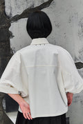 Wicked33 Stare oversized shirt in ecru (off-white), large dark green portrait graphic print on chest