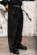 Wicked33 Ghost streetwear pants, continuous-line embroidered portrait