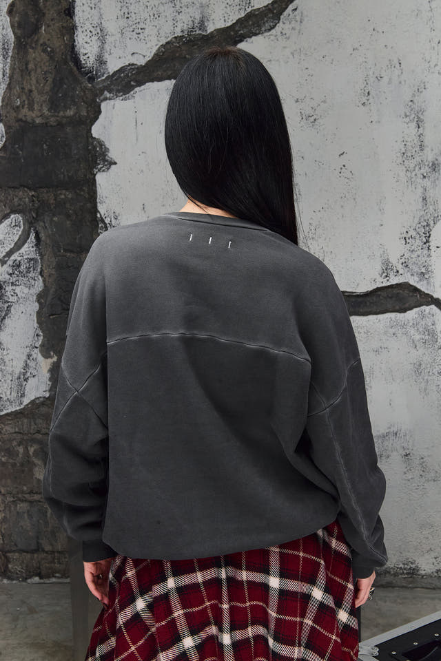 Wicked33 Thirtythree knit sweater in charcoal grey, large white “thirtythree” text print on chest