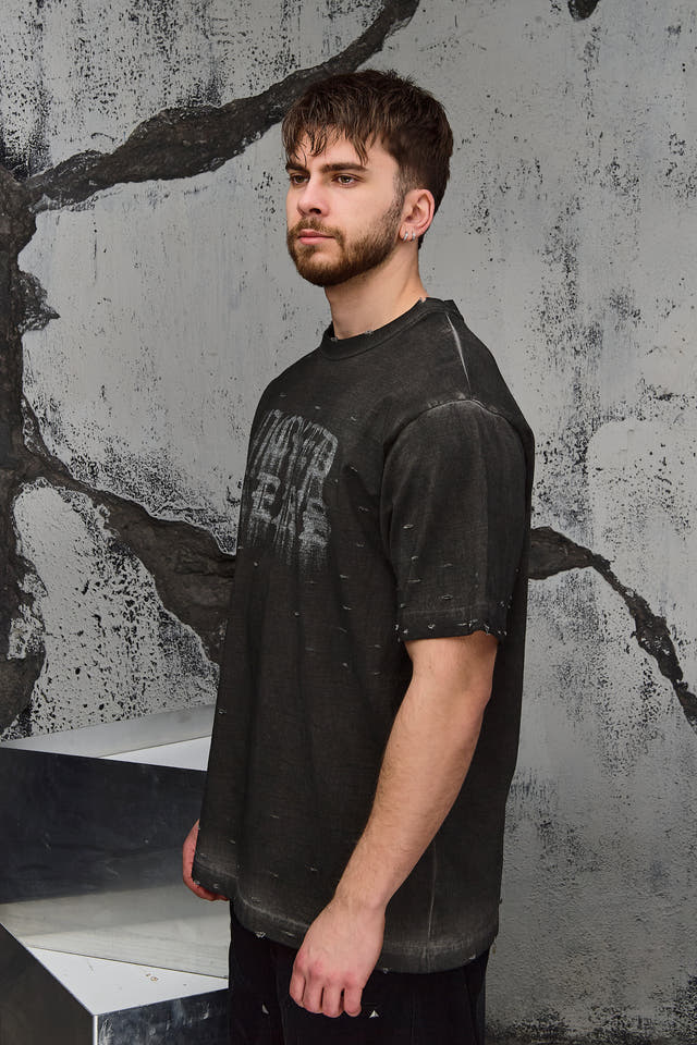 Wicked33 Burnout oversized t-shirt in dark grey / washed black, spray-effect front graphic
