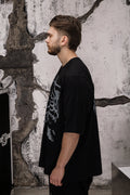 Wicked33 Skeleton oversized t-shirt in black, large rib cage graphic print with “33” on chest