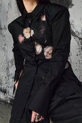 Wicked33 Fading Roses oversized shirt in black with beige and cream floral accents, asymmetric floral print on chest and cuffs