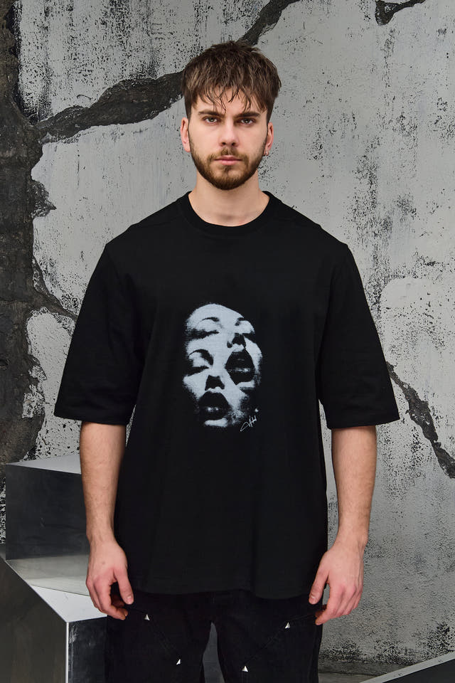 Wicked33 Alter oversized t-shirt in black, central print with doubled face effect and vintage texture