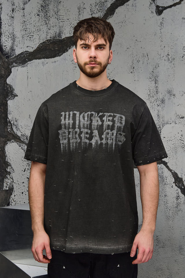 Wicked33 Burnout oversized t-shirt in dark grey / washed black, spray-effect front graphic
