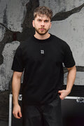 Wicked33 Ascend oversized t-shirt, large grayscale back print of baroque-style angel & man sculpture