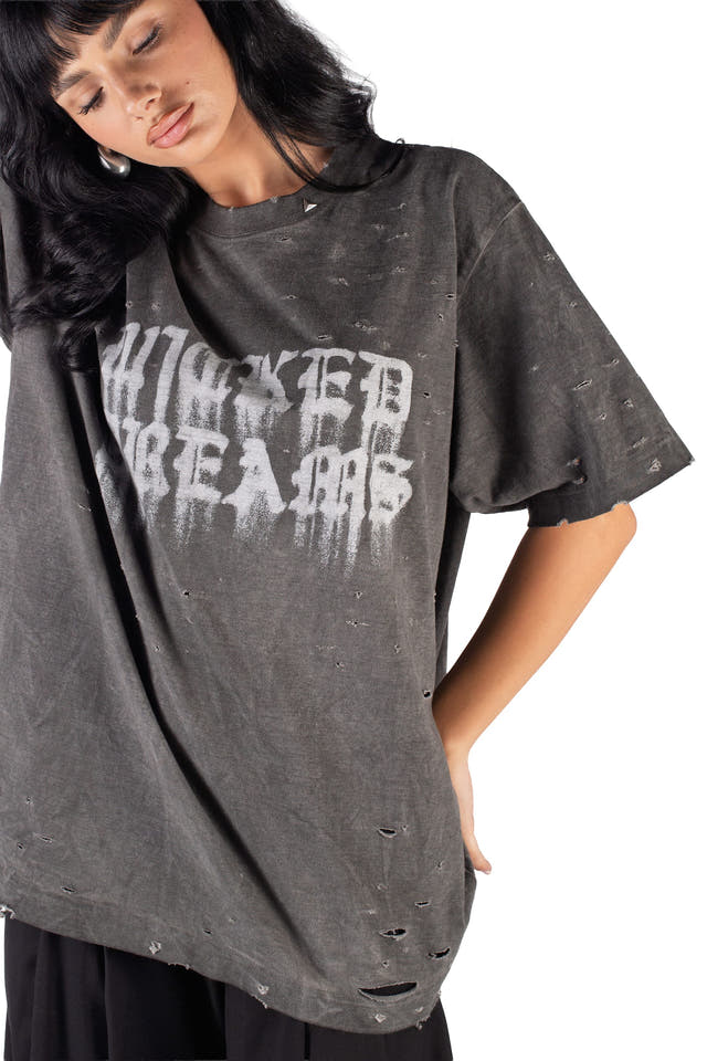 Wicked33 Burnout oversized t-shirt in dark grey / washed black, spray-effect front graphic