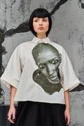 Wicked33 Stare oversized shirt in ecru (off-white), large dark green portrait graphic print on chest