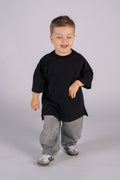 Wicked33 Born Wild oversized t-shirt in deep washed black, oversized back statement print