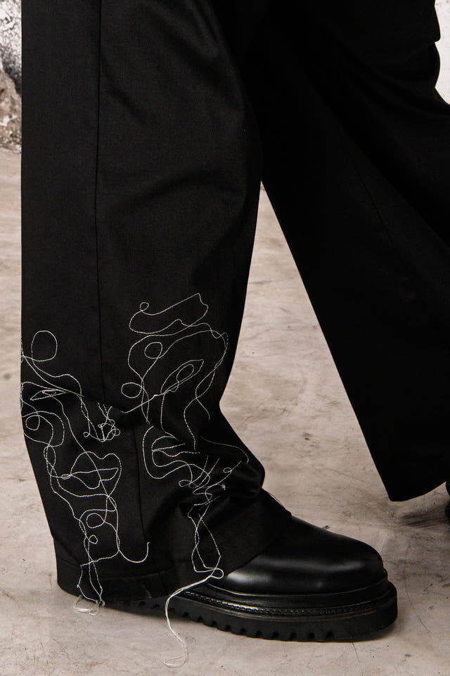 Wicked33 Ghost streetwear pants, continuous-line embroidered portrait