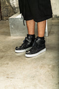 Black high-top sneakers