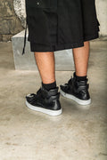 Black high-top sneakers